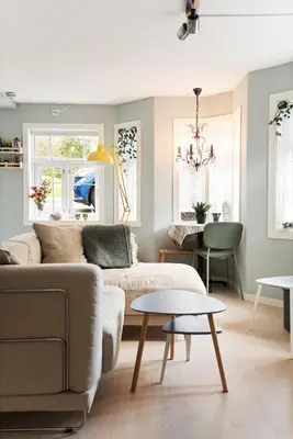 a living room with a couch and a table at Central apartement in Kristiansund in Kristiansund