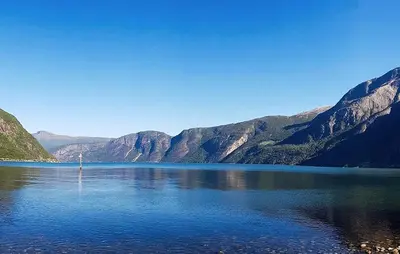 a view of a lake with mountains in the background at 3 Bedroom Lovely Apartment In Eidfjord in Eidfjord