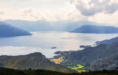 a view of a large body of water with mountains at 3 Bedroom Awesome Home In Strandebarm in Strandebarm
