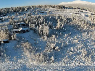 an aerial view of a house in the snow at Jantelaaven in Trysil