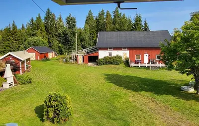an aerial view of a farm with a barn at Nice Home In Braskereidfoss With Wifi in Braskereidfoss