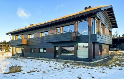 a house with a lot of windows in the snow at Amazing Apartment In Øyer With Wifi in Øyer