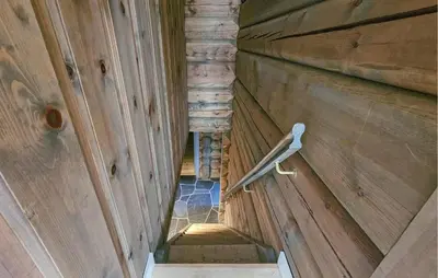 an overhead view of a staircase in a wooden building at Cozy Home In Eggedal With Wifi in Eggedal