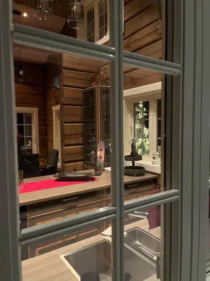 a view of a kitchen through a glass door at Luster Lodge in Luster
