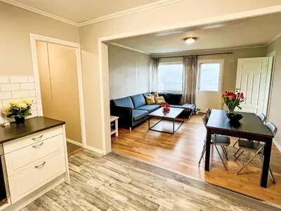 a living room with a couch and a table at Apartment Samlen Vasselgård by Interhome in Herand
