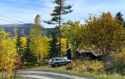 a car parked on the side of a road at 4 Bedroom Nice Home In Trysil in Trysil