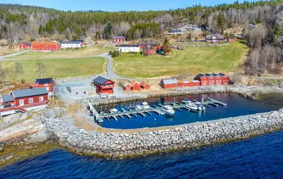 an aerial view of a marina with boats in the water at 2 Bedroom Stunning Home In Bjugn in Moen
