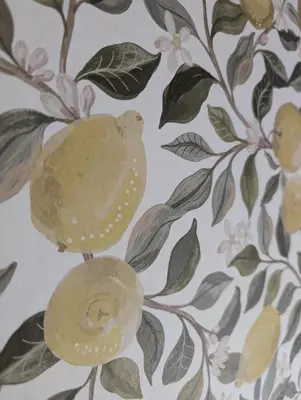 a wallpaper with a bird on a tree with flowers at Lundenhuset 1917 - historic house in the heart of Ulsteinvik in Ulstein