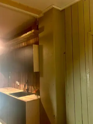 a kitchen with a sink and a counter top at Central, charming, 1800s apartment in Lii