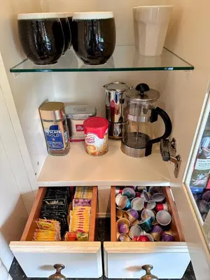 a drawer of a refrigerator filled with food at Spacious Group Villa with Jacuzzi and Views in Askøy
