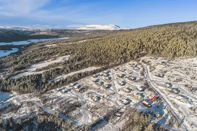an aerial view of a ski resort in the snow at New luxury cabin in Geilo with hot tub, mountain views & ski access in Geilo
