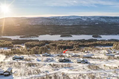 an aerial view of a village in the snow at New luxury cabin in Geilo with hot tub, mountain views & ski access in Geilo