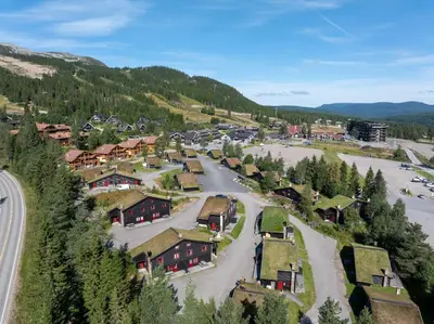 an aerial view of a small village in the mountains at Vikinggrenda 16A by Vacation Trysil in Trysil