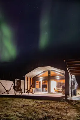 an igloo house with the aurora in the sky at Unique Nature Hideaway Close to Norefjell