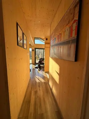 a room with wood paneling and a wooden floor at Unique Nature Hideaway Close to Norefjell