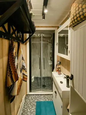 a bathroom with a shower and a sink at Cabin With Ski Inout Near Gribbe, Valdres in Tisleidalen