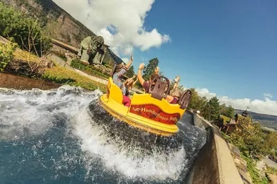 a group of people riding a roller coaster in the water at Family cabin in Hafjell, ski in-ski out in Hafjell