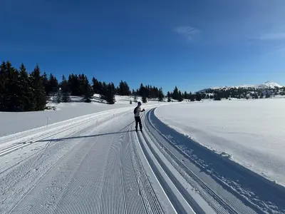 a man is standing on a snow covered road at Fjellspa med Fantastisk utsikt og Høy standard in Aurdal