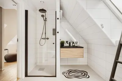 a bathroom with a shower and a sink at Modern apartment on Bryggen Walking distance to everything! in Bergen