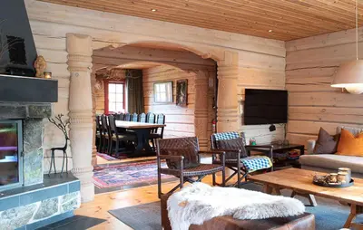 a living room with a couch and a fireplace at Amazing Apartment In Bjorli With Wifi in Bjorli