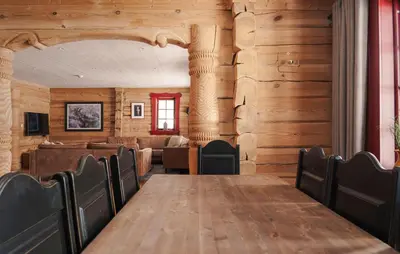 a dining room with a table and chairs at Gorgeous Apartment In Bjorli With House A Panoramic View in Bjorli