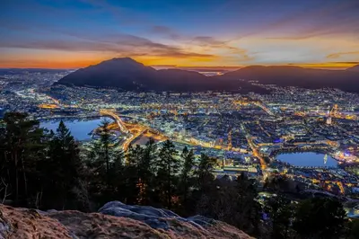a view of a city at night from a mountain at Cozy Apartment in Bergen in Bergen
