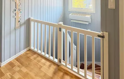 a staircase with a white railing in a room at Beautiful Home In Kvammen With House A Panoramic View in Kvammen