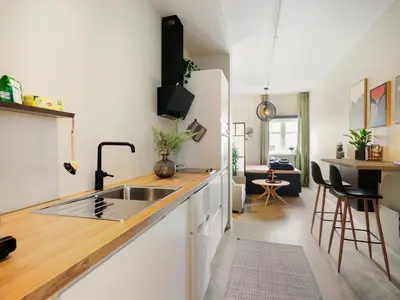 a kitchen with a sink and a counter top at 3FF - Newly renovated studio apt in the middle of the city centre in Trondheim
