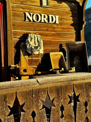 a wooden chest with a nord sign and stars on it at Charming Guesthouse farm in Hølera