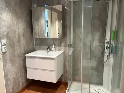 a bathroom with a sink and a shower at 4 person holiday home in Eidsvåg in Eidsvåg