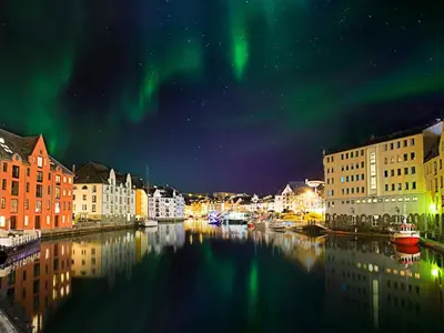 an image of a city with the aurora in the sky at 4 star holiday home in Eidsvåg in Eidsvåg