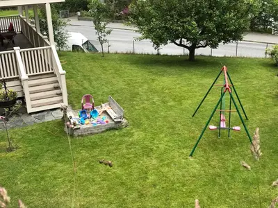 an aerial view of a playground in a yard at Near Trolltunga and centre of Odda in Odda