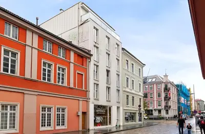 a group of buildings on a city street at Studio apartment in city center in Bergen