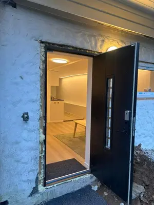 a door that is open to a room at Family friendly apartment with parking in Bergen