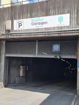 a tunnel with a sign on top of it at Sentralt,unikt lite bergenshus med sjel på fine Nøstet! in Bergen