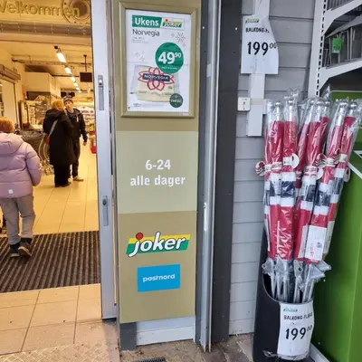 a joker vending machine in a shopping mall at A house for rent in Osen, only 45 min from Trysil in Åmot