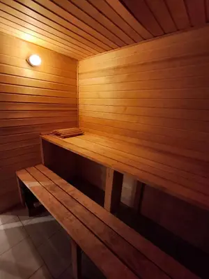 a wooden sauna with a wooden bench in it at A house for rent in Osen, only 45 min from Trysil in Åmot
