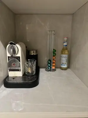 a kitchen counter with a toaster and a blender at leilighet in Bergen