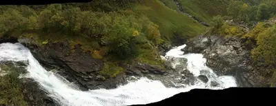 an aerial view of a river on a mountain at Hjelledalen Hyttesenter in Hjelle