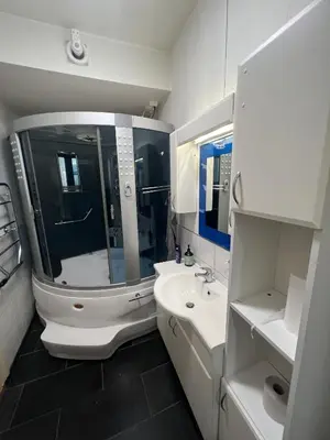 a bathroom with a toilet and a sink at Apartment in the heart of Bergen in Bergen