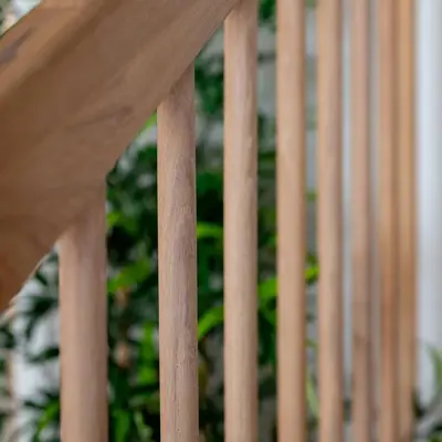 a close up of a wooden stair railing at Renovated Apartment in Central Area in Bergen