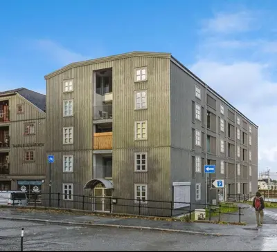 a building on the side of a street at Modern apartment in central Trondheim in Trondheim