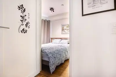 a bedroom with a bed in a room at Apartment in the heart of Bergen in Bergen