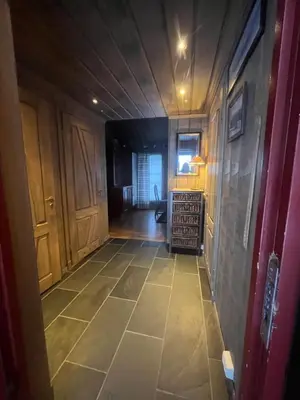 a hallway of a house with a tile floor at The View - Mountain cabin with stunning views in Stranda