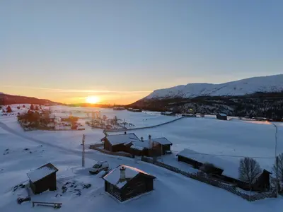 an aerial view of a village in the snow at Historical & exclusive cabin - Ski in-out - 18 people in Nord-Fron