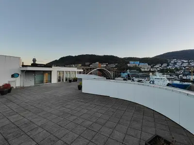 a balcony of a building with a view of a city at Modern apartment in central Bergen in Bergen