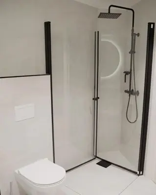 a bathroom with a shower and a toilet at Leilighet 101 og 102 i Brunholmgata 9 in Ålesund
