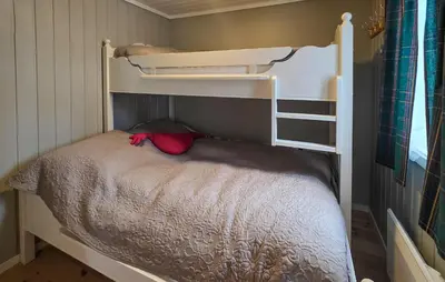 a small bedroom with bunk beds in a house at Nice Home In Rauland With Wifi in Rauland