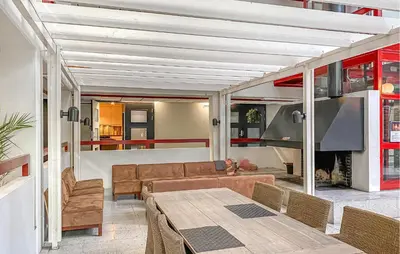 a living room with a couch and a table at Amazing Apartment In Bjorli With Wifi in Bjorli