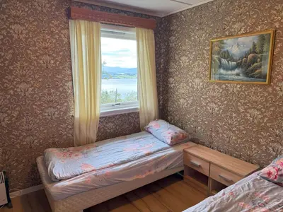 a small room with a window and a small bed at Holiday Home Stabben white House by Interhome in Aure